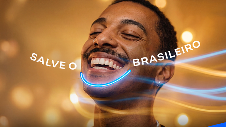 Homem sorrindo destaca a campanha Salve o Sorriso Brasileiro.